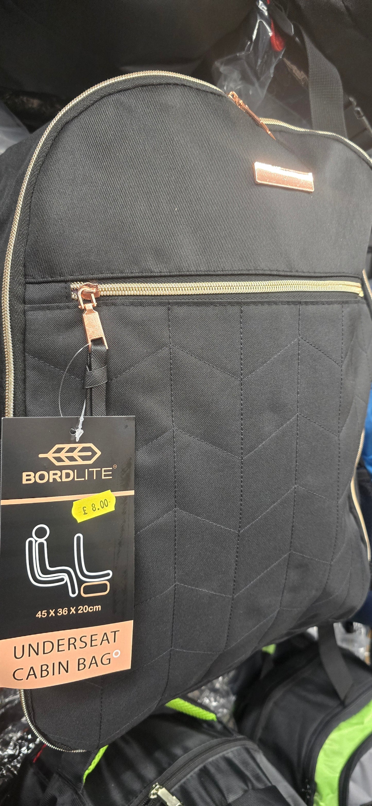 EASYJET under seat backpack 45x36x20cm in Black with rose gold trim.